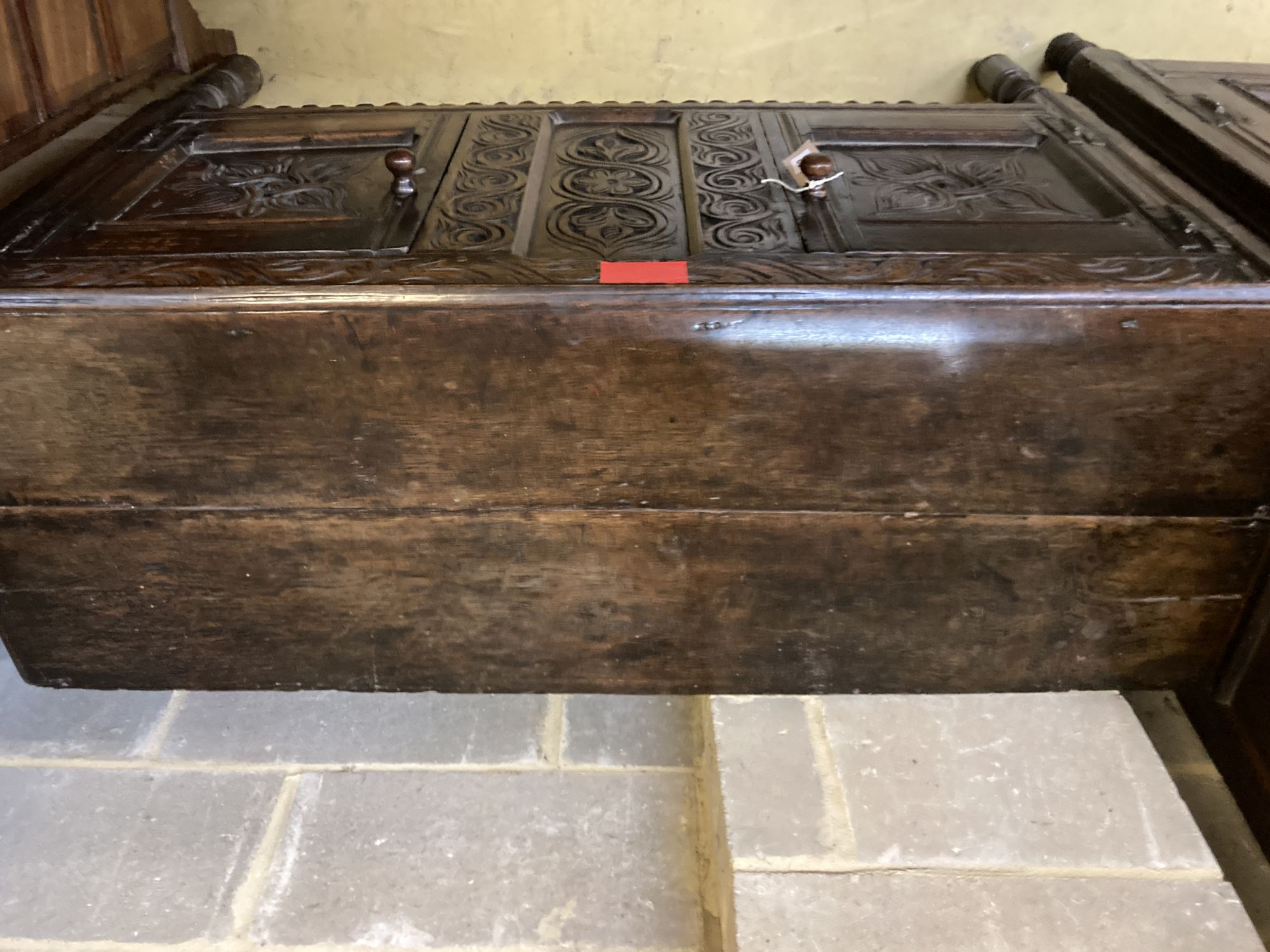 A 17th century and later oak two door cabinet, width 126cm, depth 46cm, height 94cm